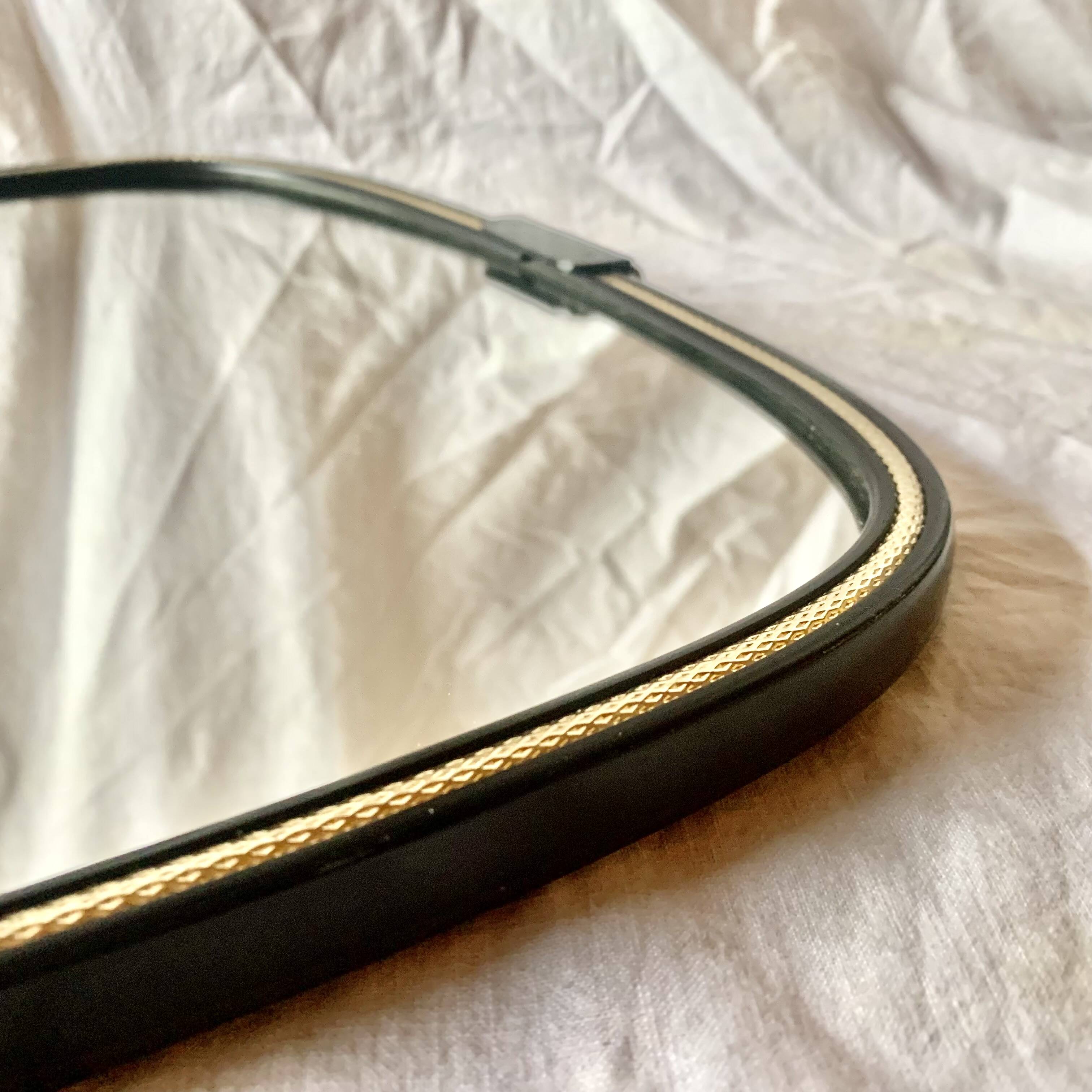 Antique rearview mirror - black and gold plastic frame - 34 x 55 cm