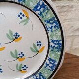 Ancienne assiette à fleurs dit cul noir
