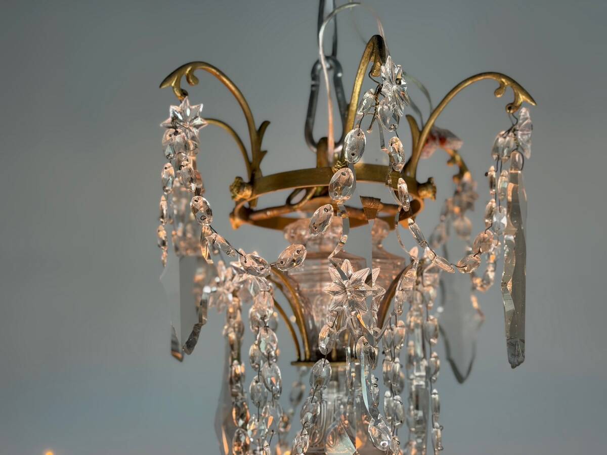 Bronze chandelier with cut crystal pendants, circa 1800.