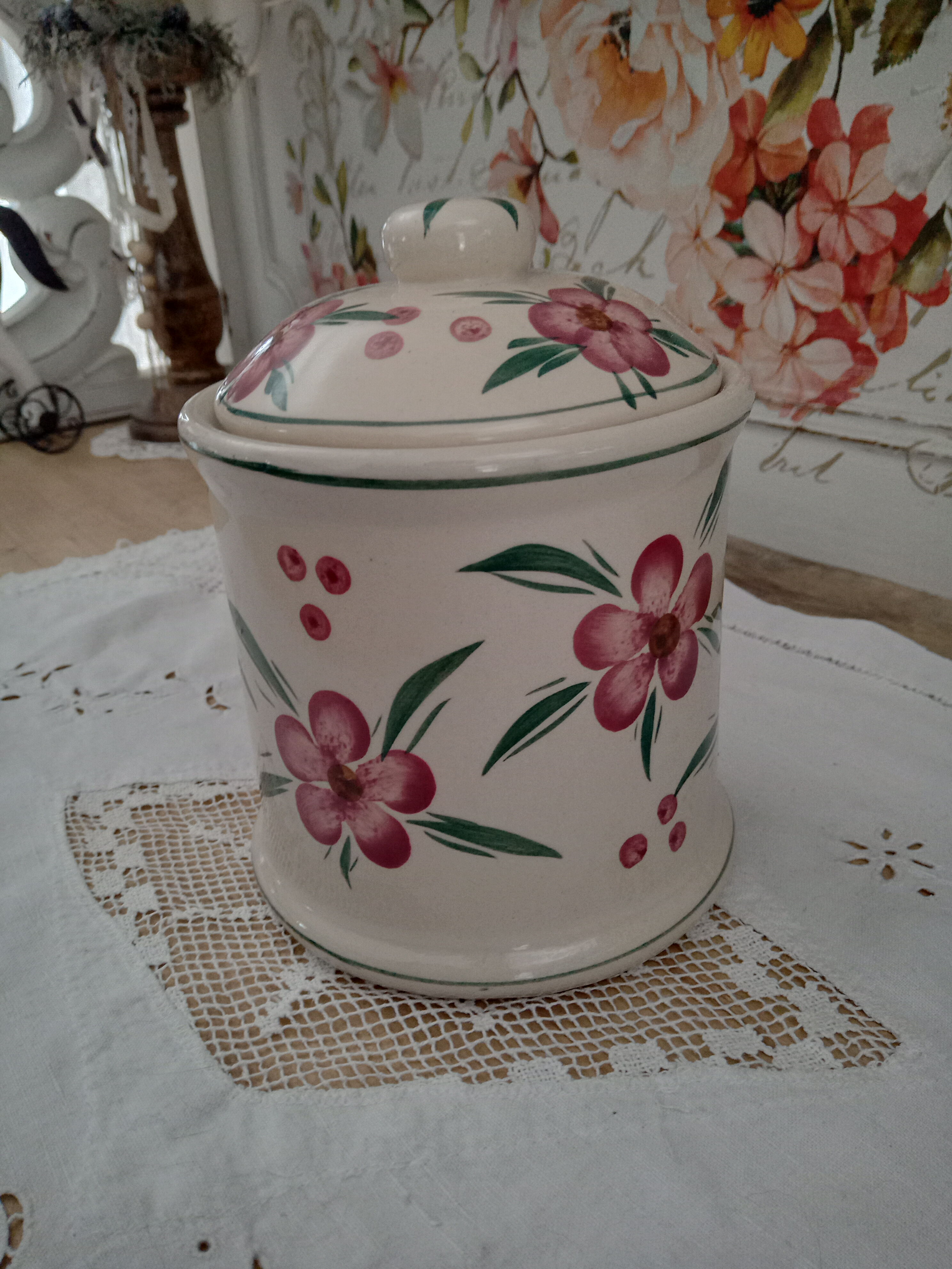 Vintage beige ceramic lid jar decorating pink flowers