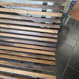 Old cast iron garden bench with oak slats