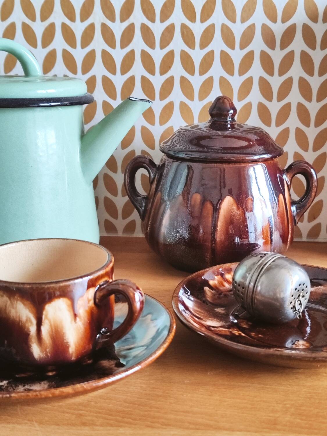 Vintage coffee service in glazed brown ceramic.