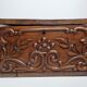Ancien coffret en bois sculpté à décor de mascaron