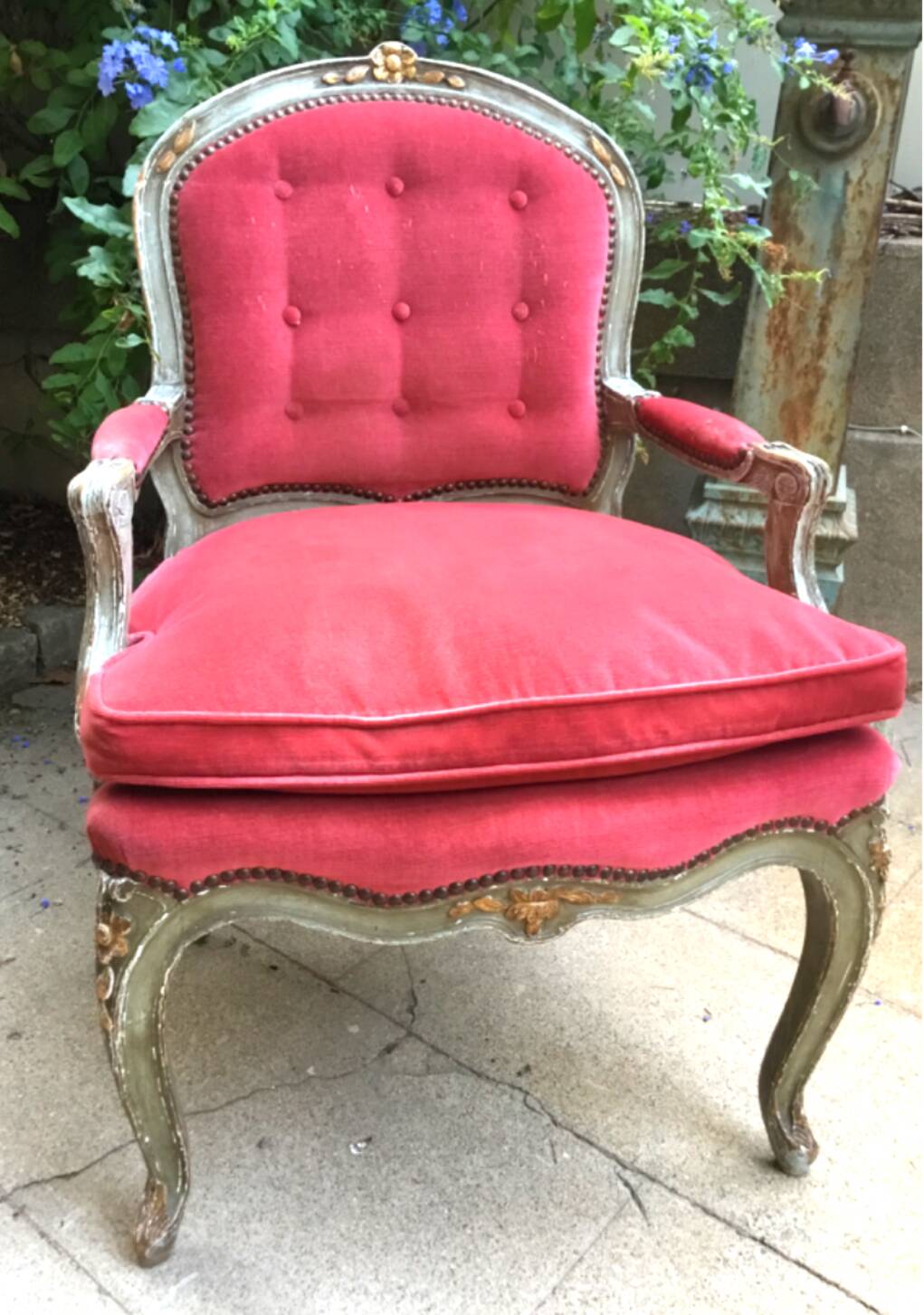 Louis XV style armchair in molded and carved wood with gray and gold patina