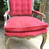 Louis XV style armchair in molded and carved wood with gray and gold patina