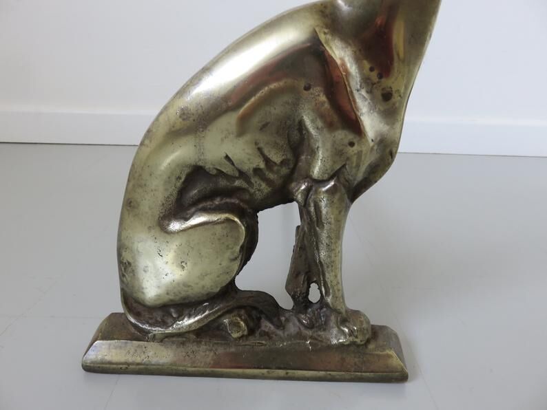 Pair of "dog" channels in solid bronze 30/40