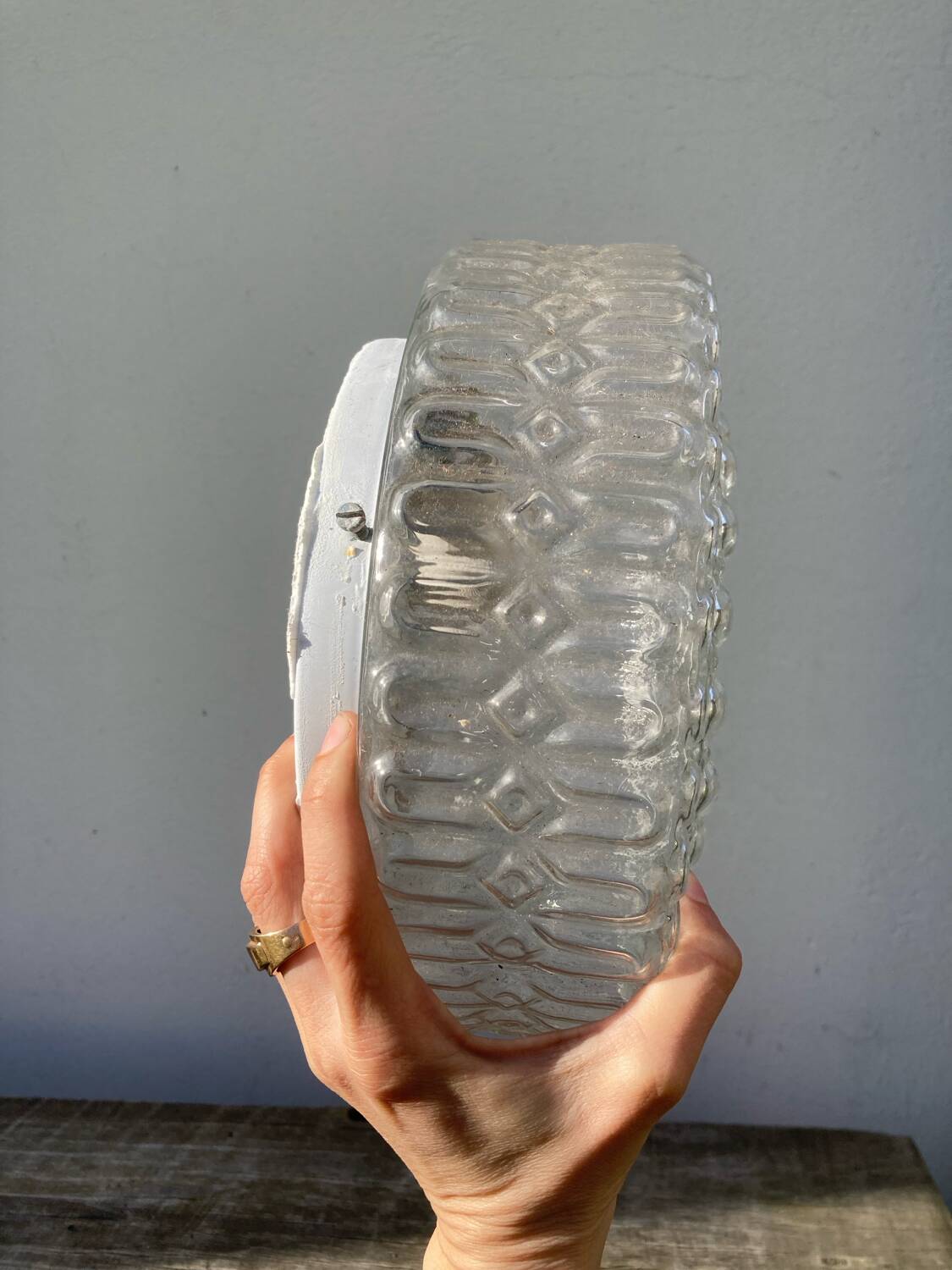 Pair of transparent round glass wall lights