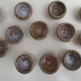 12 plats individuels à escargots en grès beige