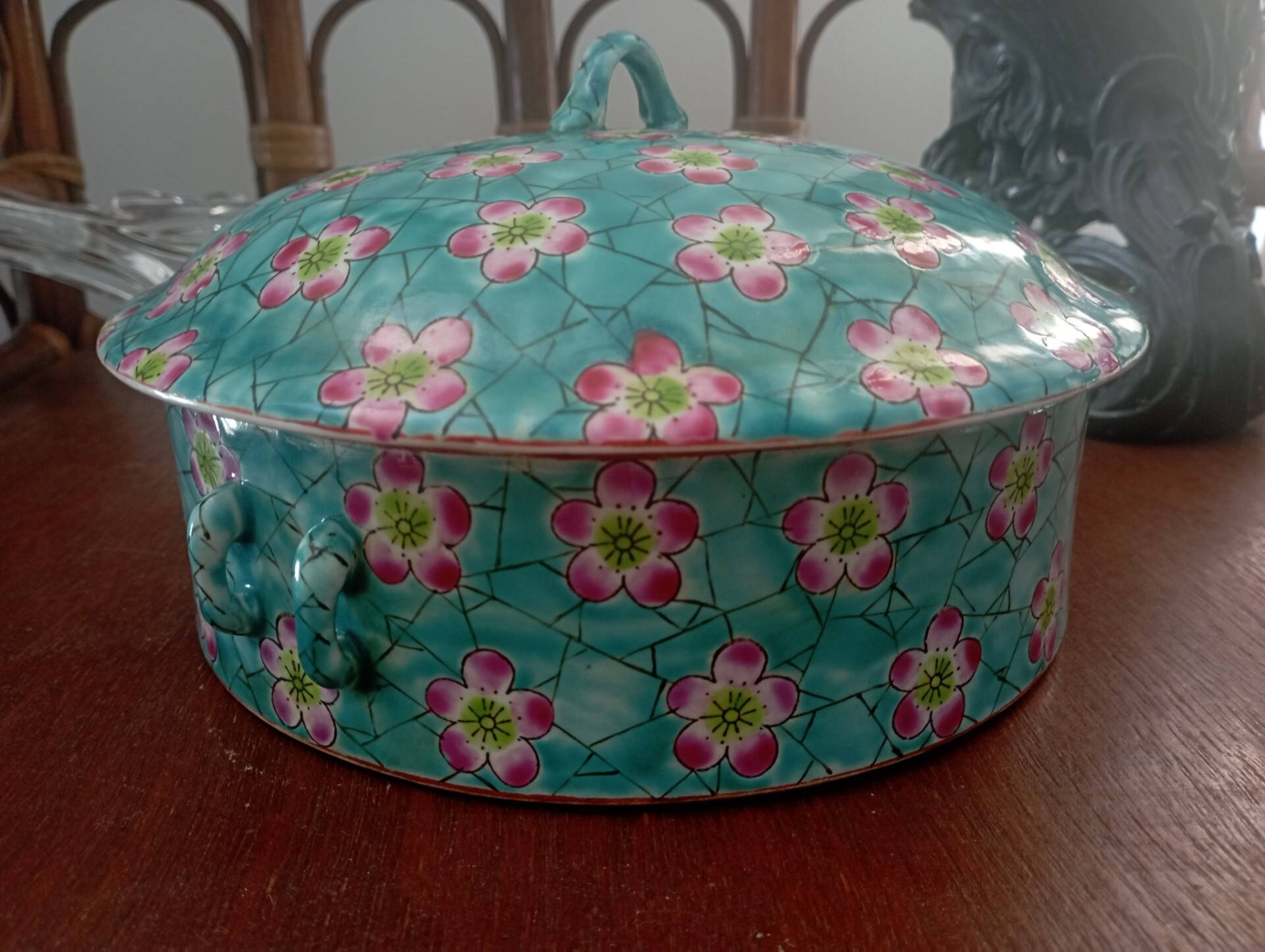 Old glazed ceramic covered pot