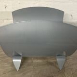 Designer log holder in enameled sheet metal