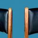 Pair of Scandinavian chairs in wood and black skai