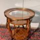 Display table in Louis XV style made of rosewood and violet wood.