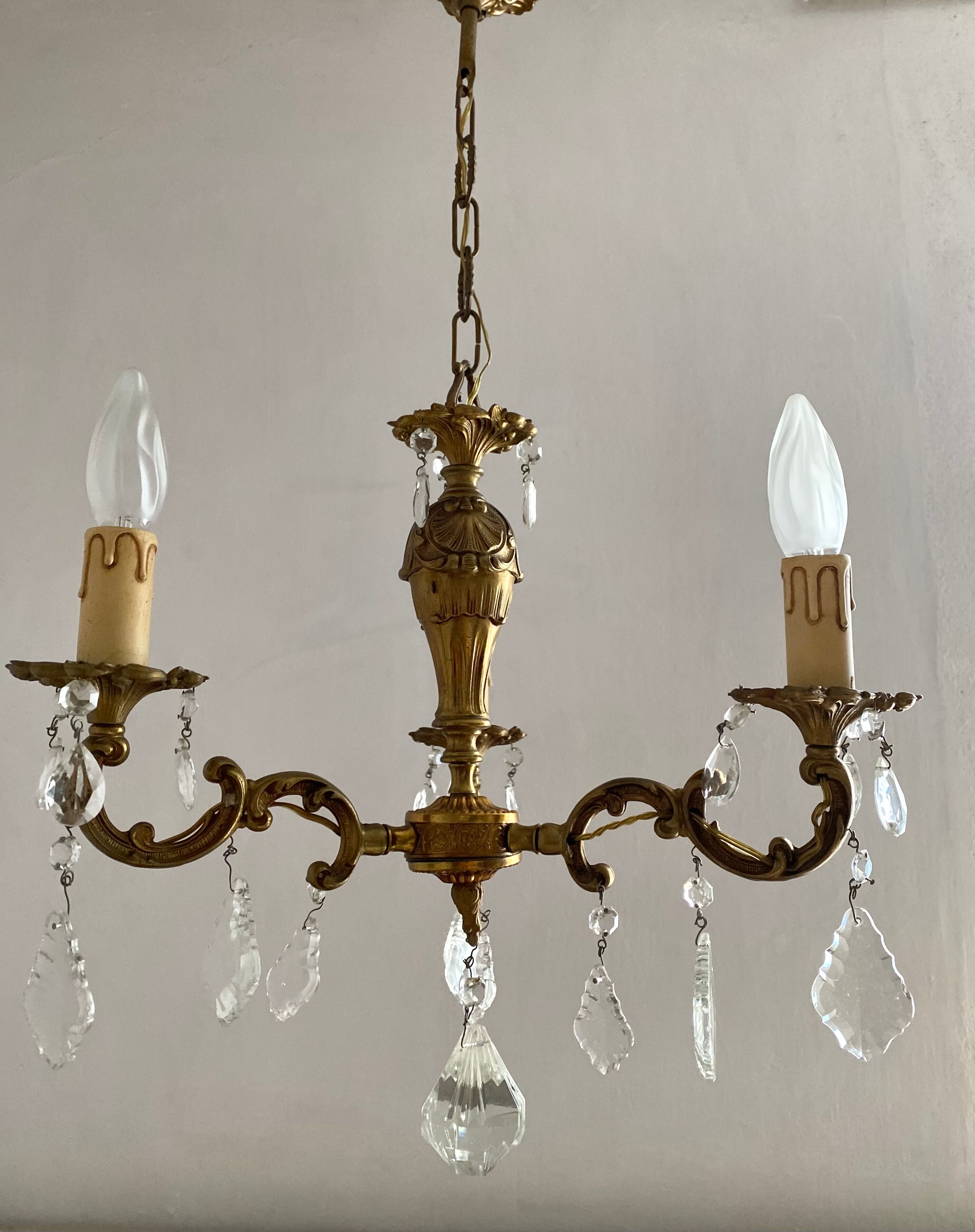Chandelier with tassels and brass