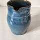 Blue glazed stoneware jug