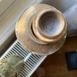 Gourd and vase in shell casing