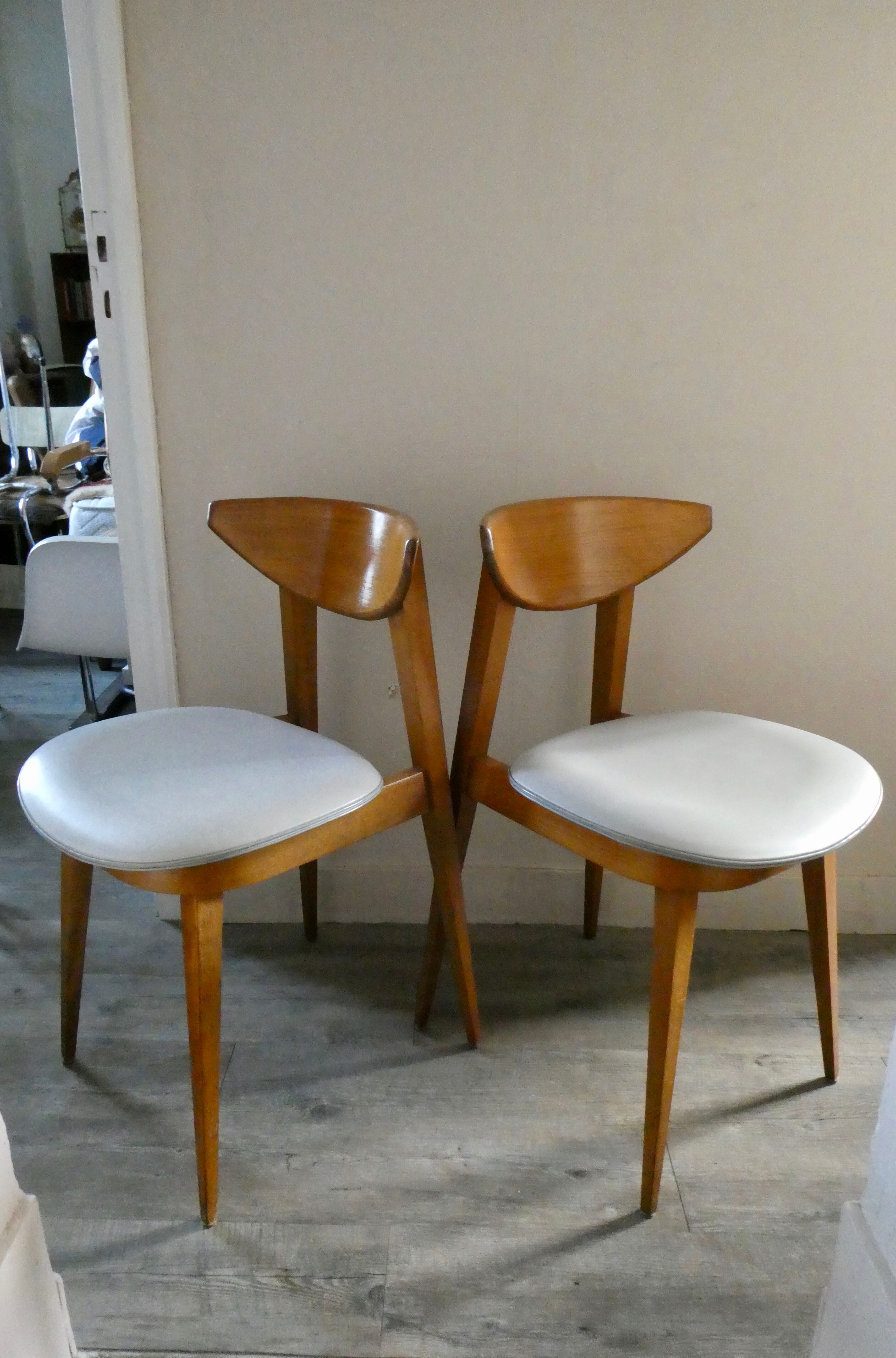 Pair of wooden chairs and skai scandinavian style