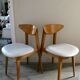 Pair of wooden chairs and skai scandinavian style