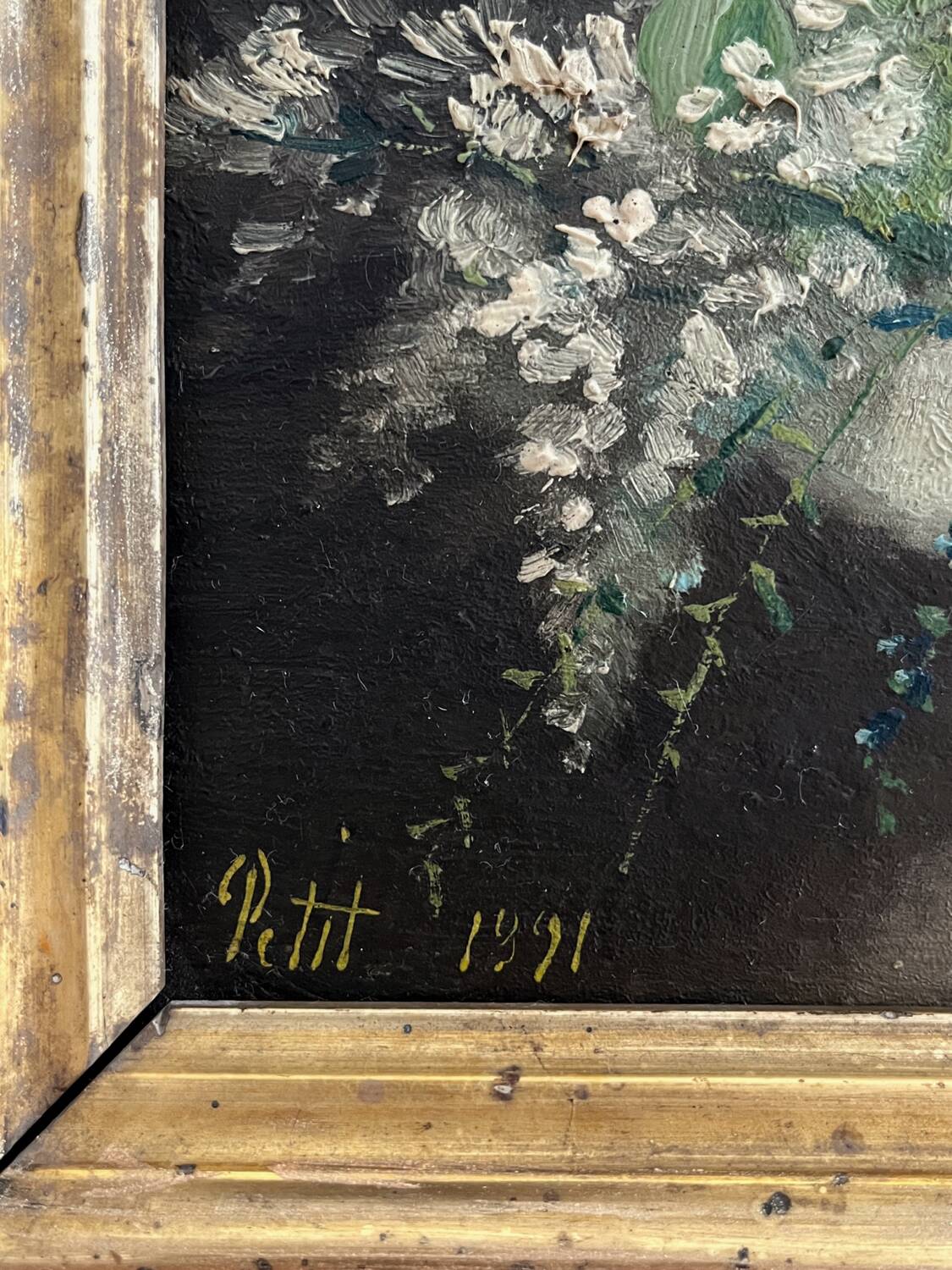Old oil painting on wood of a bouquet of flowers signed Petit.