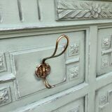 Cloakroom with sage green wall coats