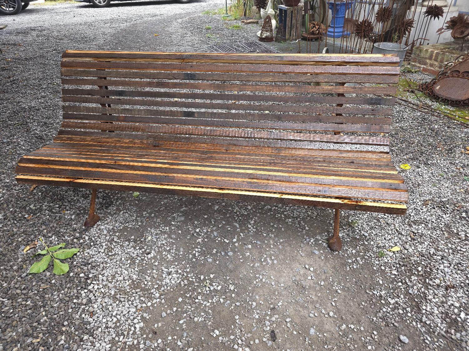 Cast iron garden bench with wooden slats