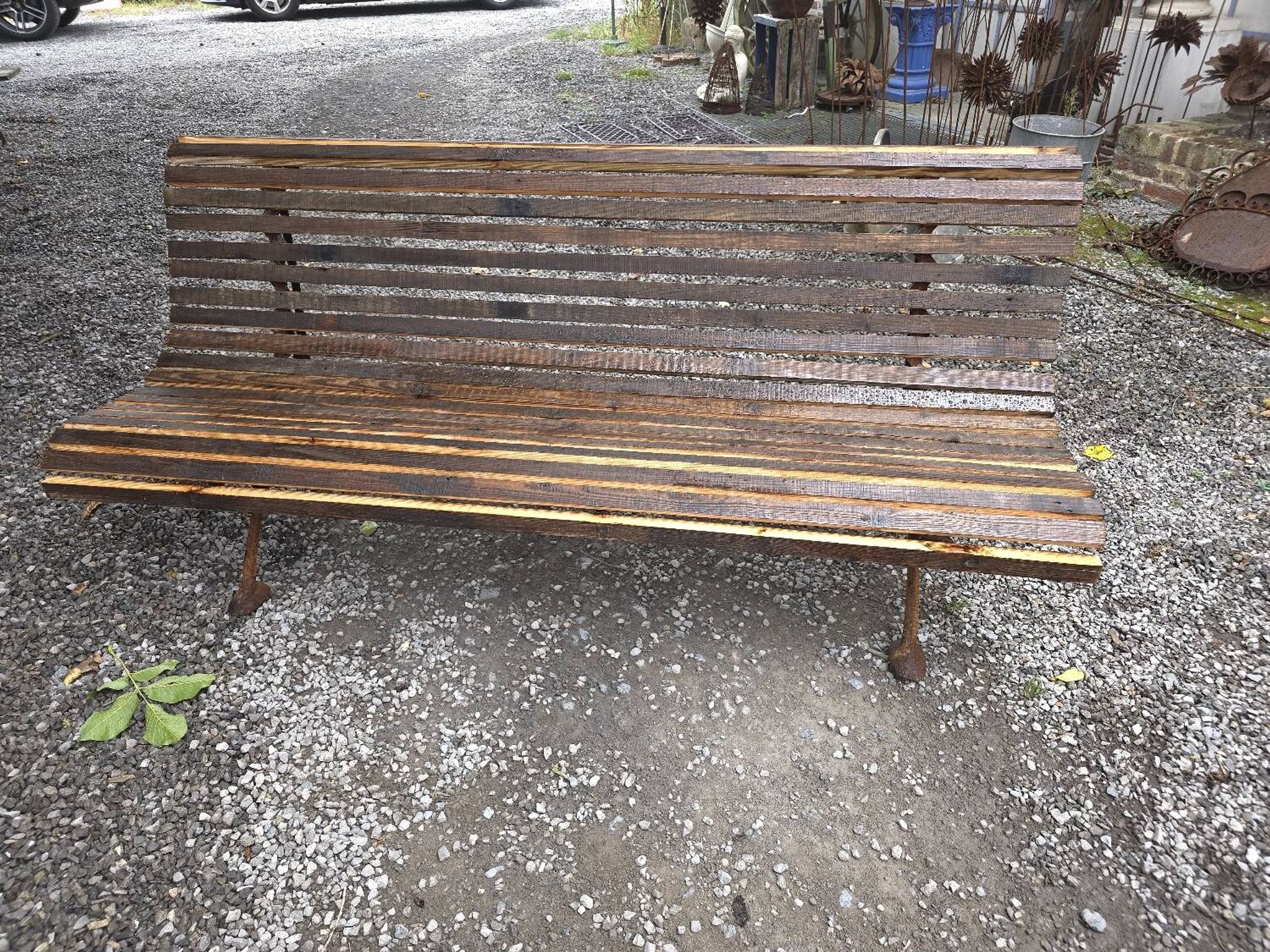 Cast iron garden bench with wooden slats