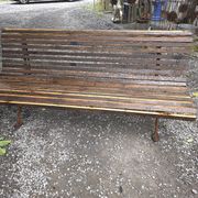 Cast iron garden bench with wooden slats