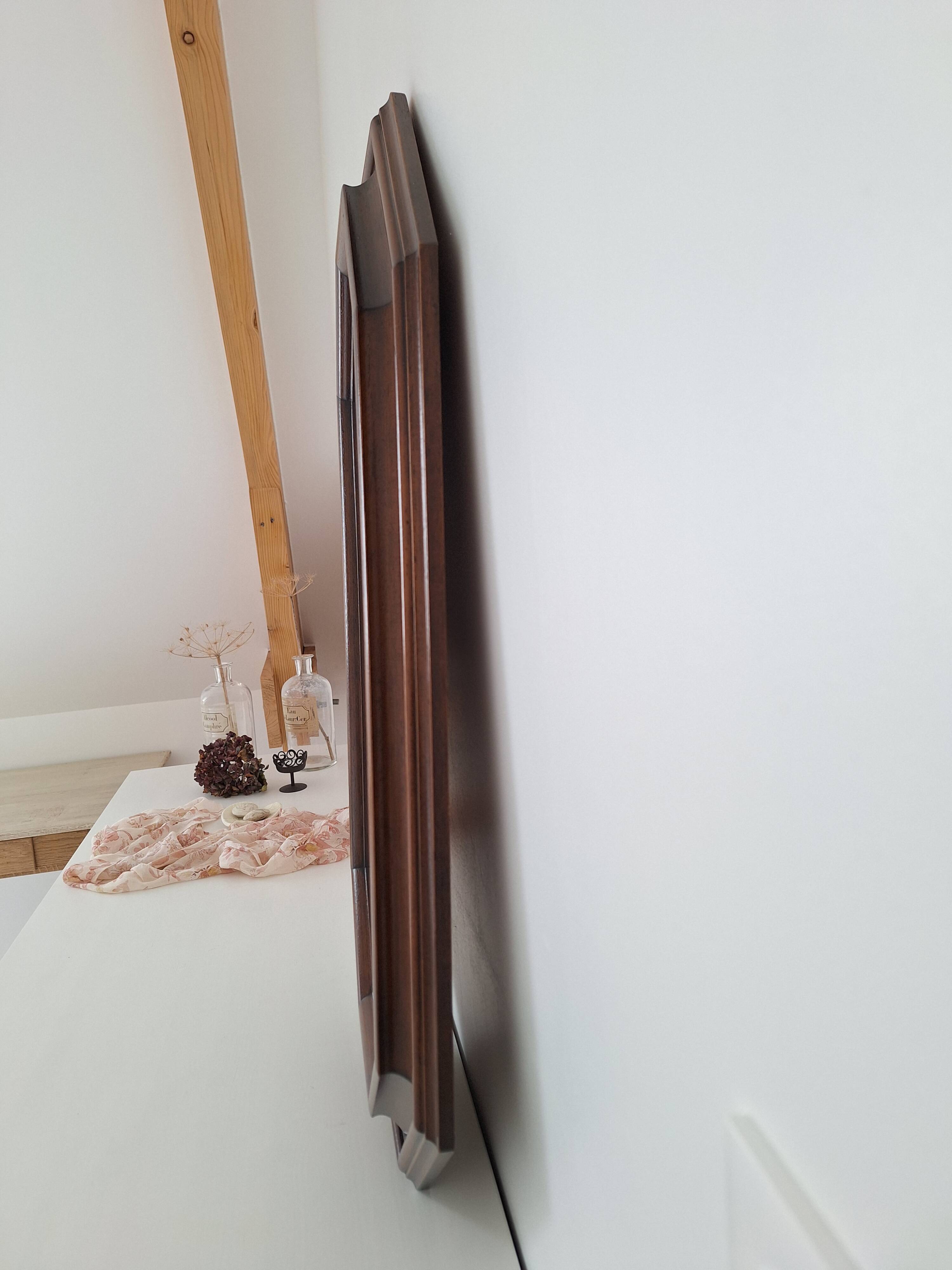 Octagonal wooden mirror from the 1980s.