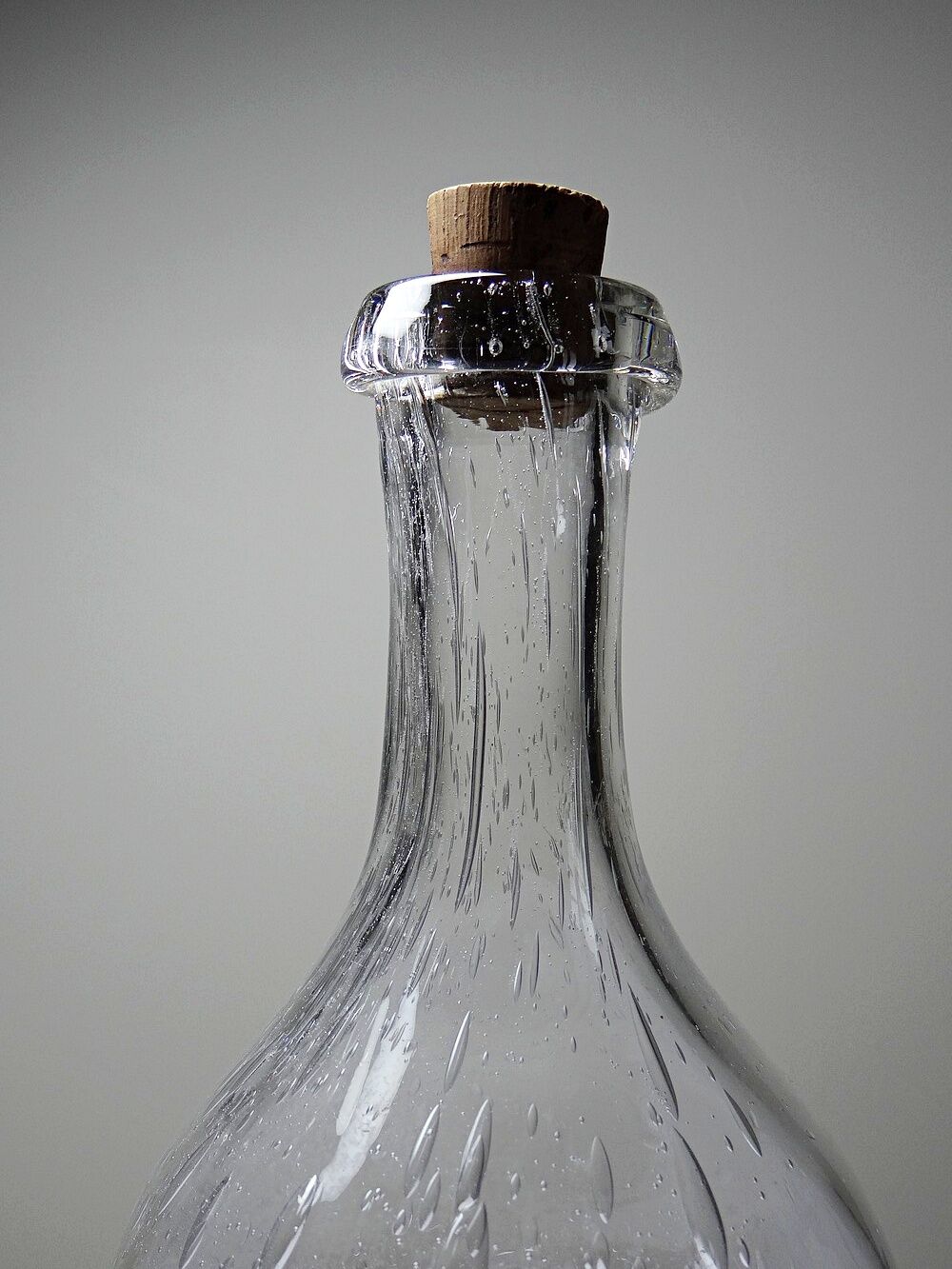 Large antique blown glass bottle with bubbles, early 20th century 1900-1920.