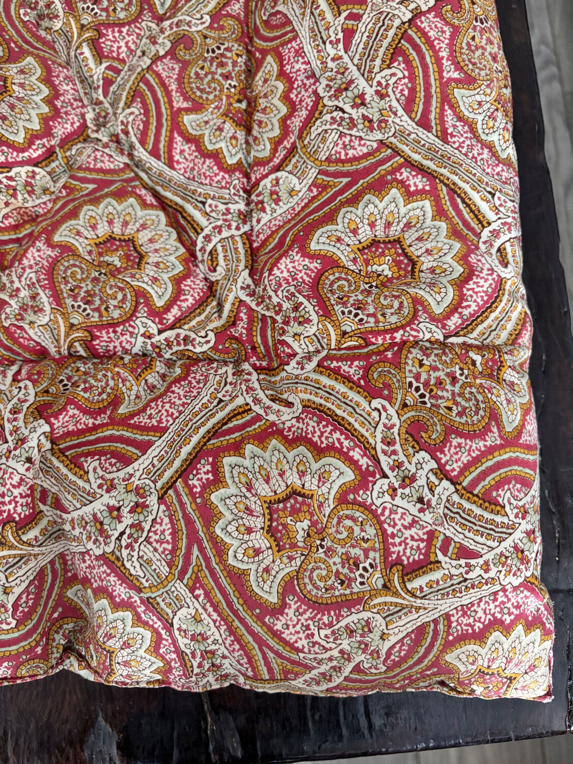 Vintage duvet/bedspread with a paisley pattern.