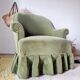 Green velvet armchair