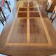 Extendable table in cherry wood with wrought iron legs.