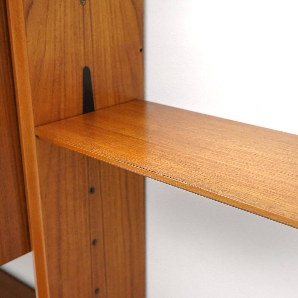 Library with wooden uprights by A.V. Contemporary Furnishings, 1960s.