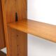 Library with wooden uprights by A.V. Contemporary Furnishings, 1960s.