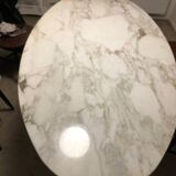 Oval dining table, calacatta oro marble top