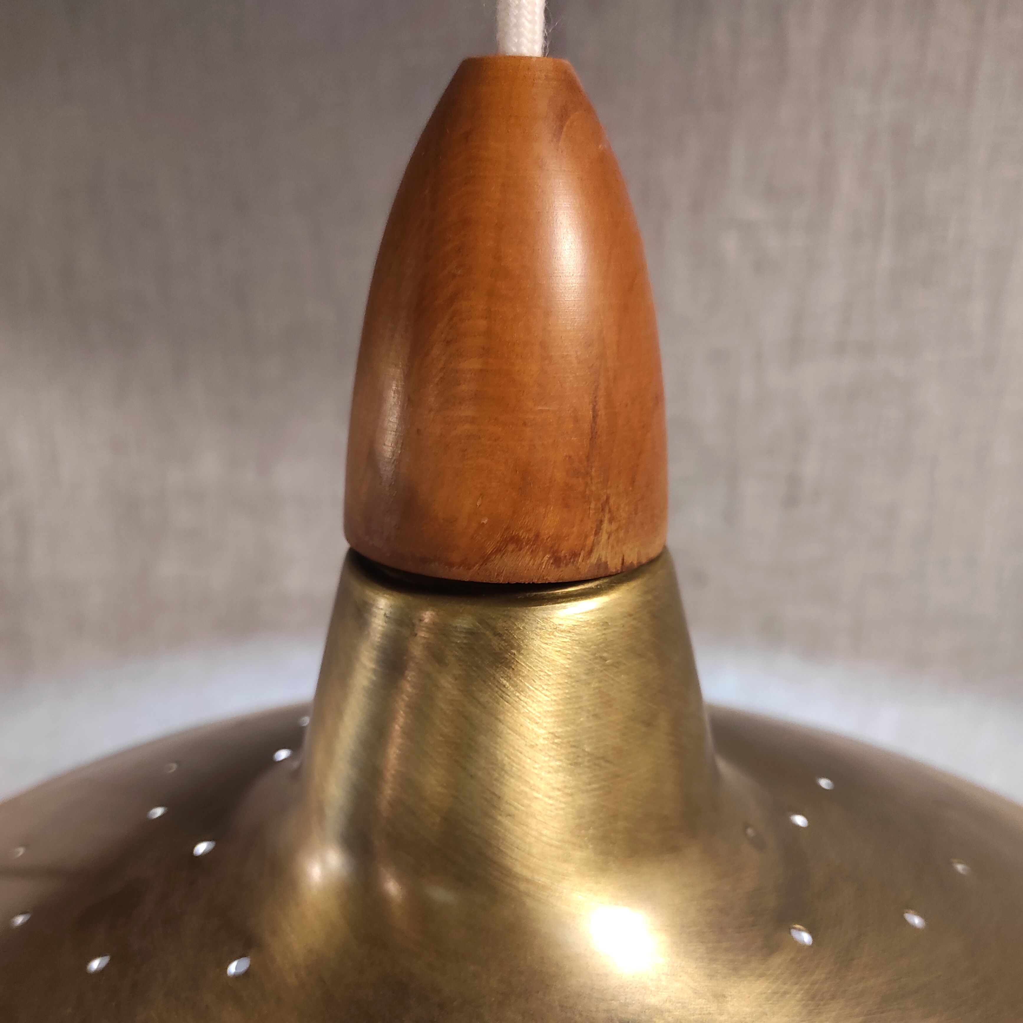 Brass and teak suspension