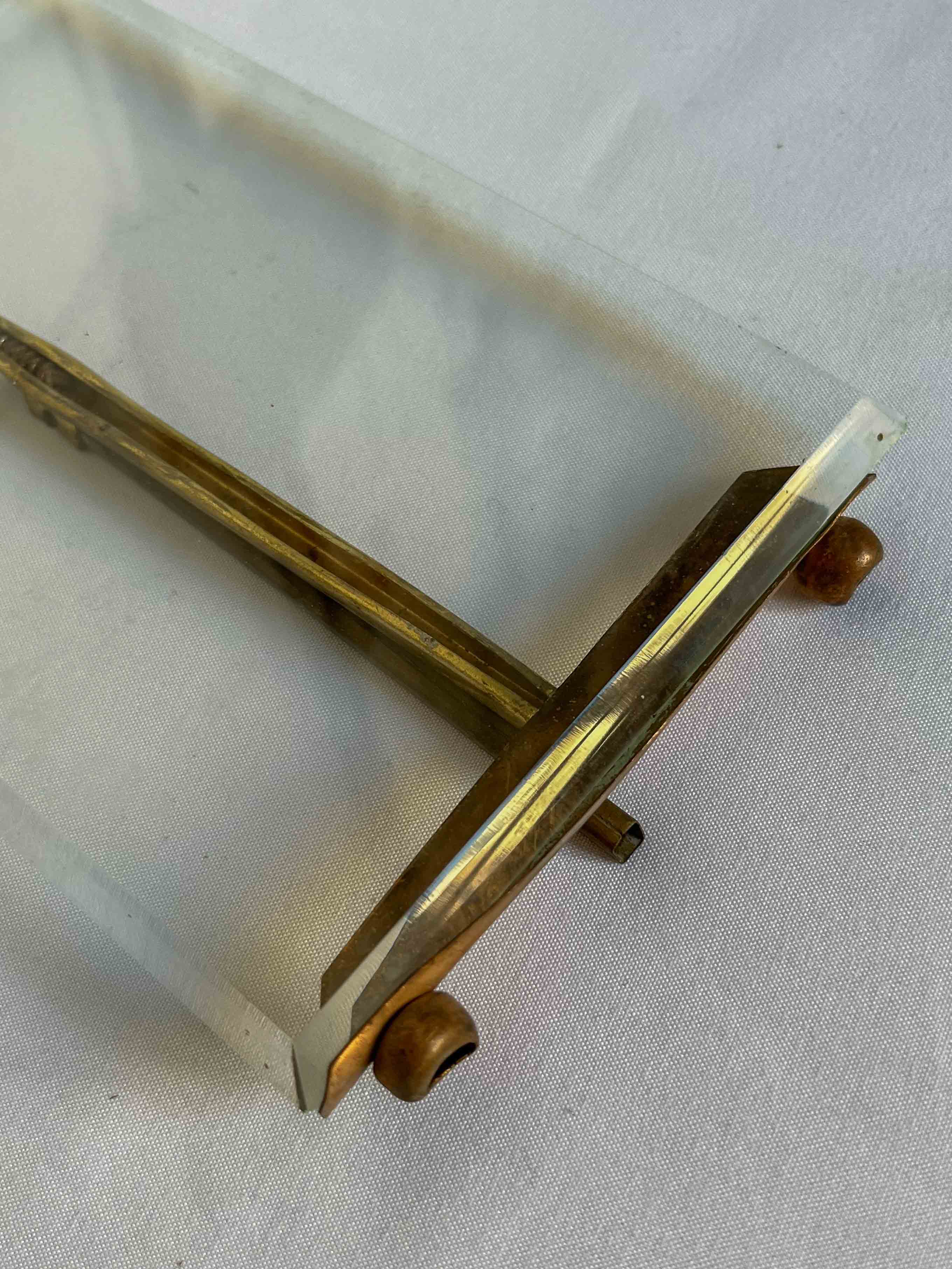 Brass frame and beveled glass