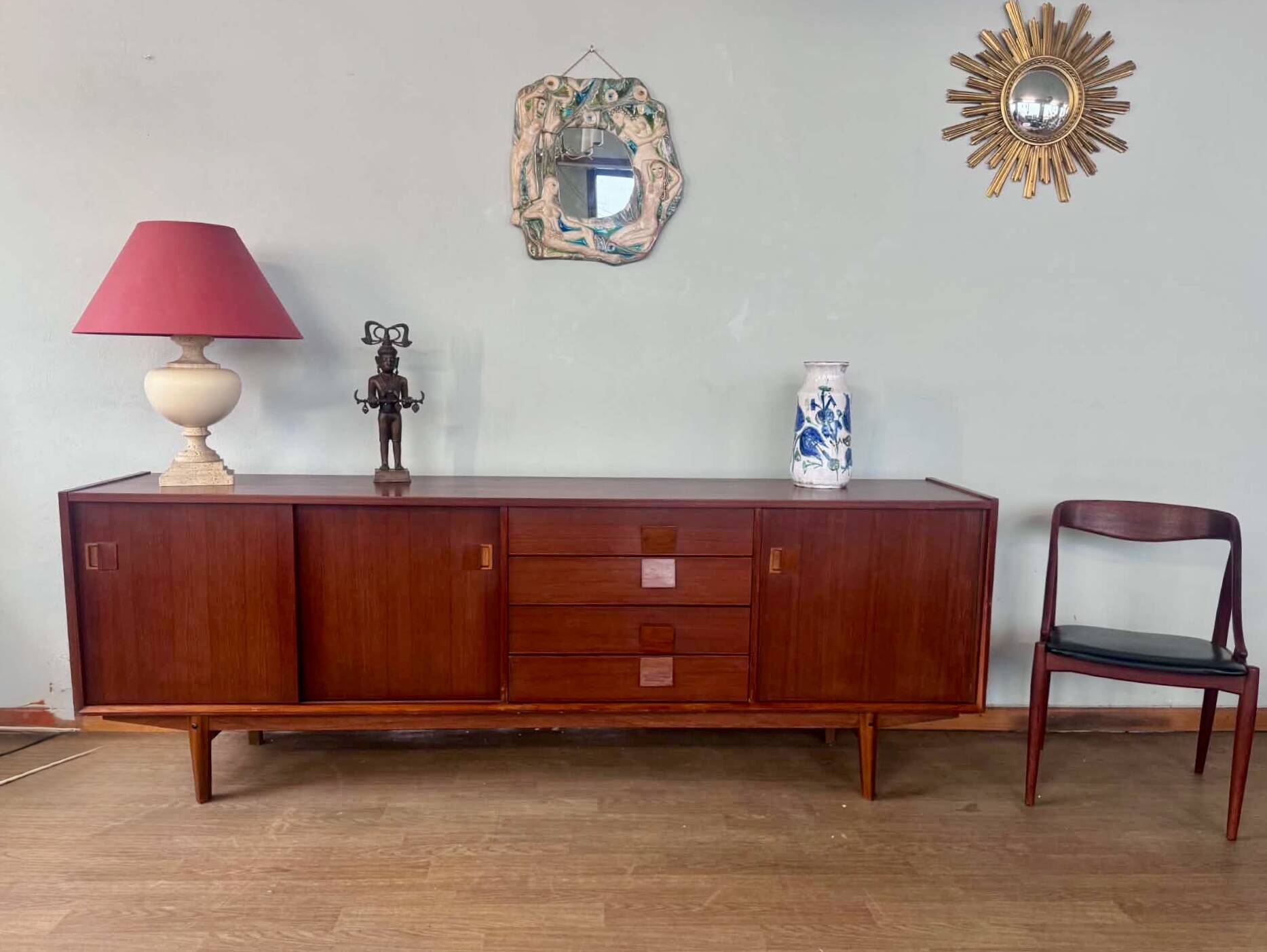 Scandinavian teak sideboard, 230 cm long, with 3 doors and 4 drawers.