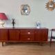 Scandinavian teak sideboard, 230 cm long, with 3 doors and 4 drawers.