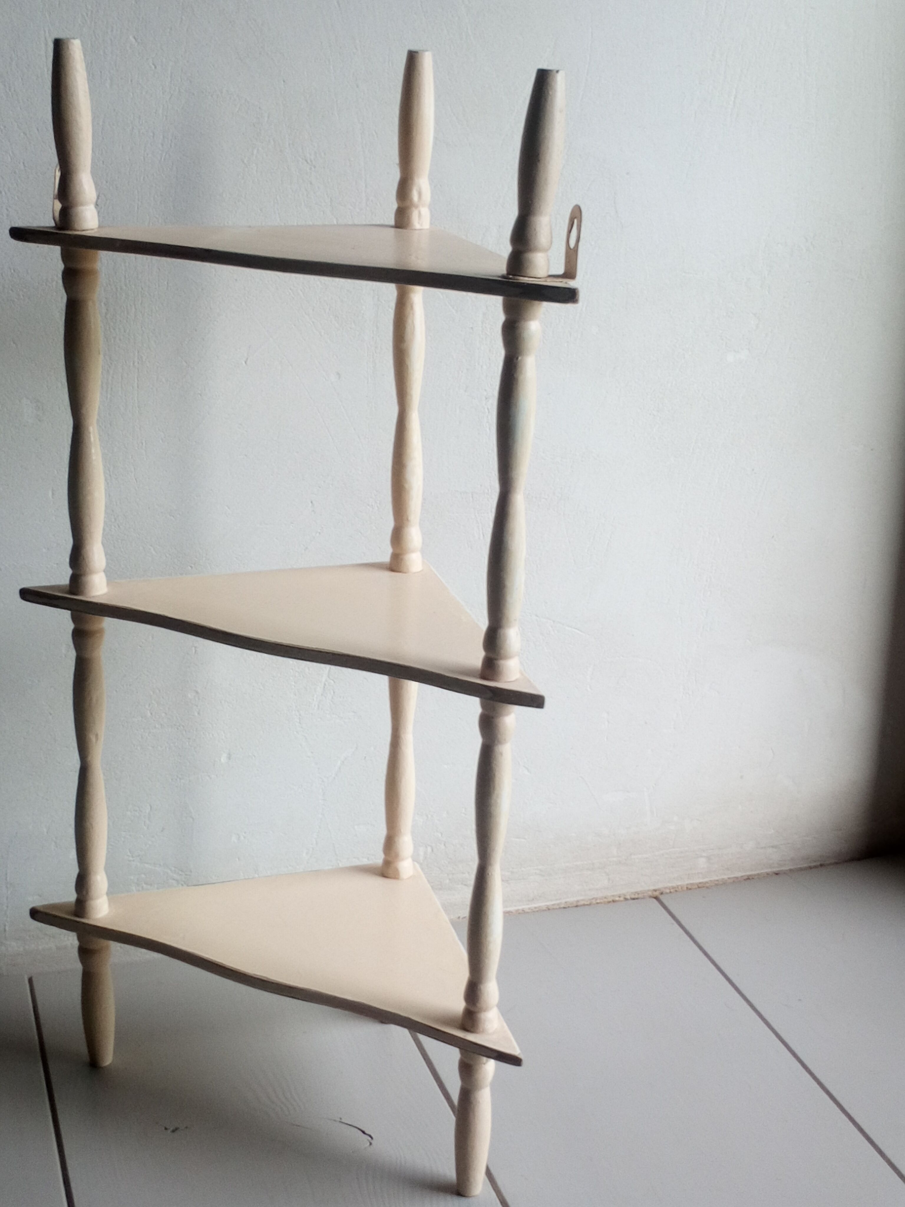 Old corner wall shelf turned wood