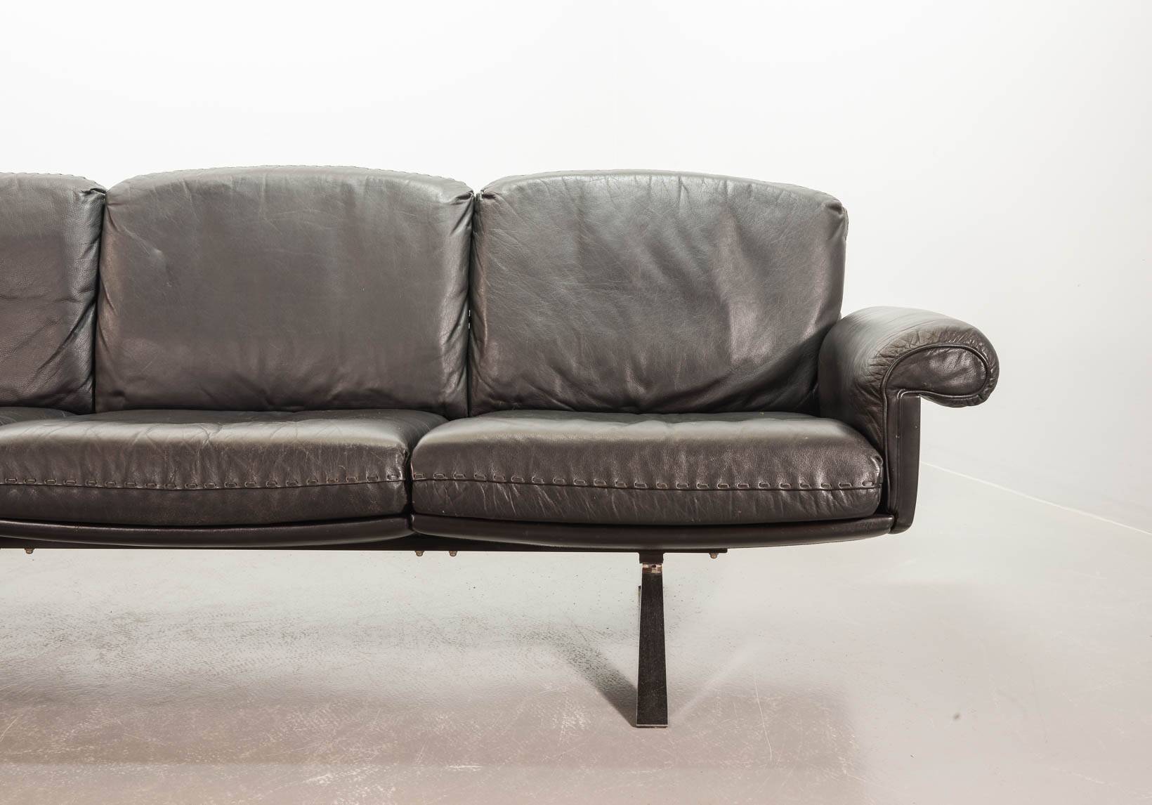 De Sede Black Leather Strap Stitched Three-Seat Sofa DS31. Switzerland, 60s