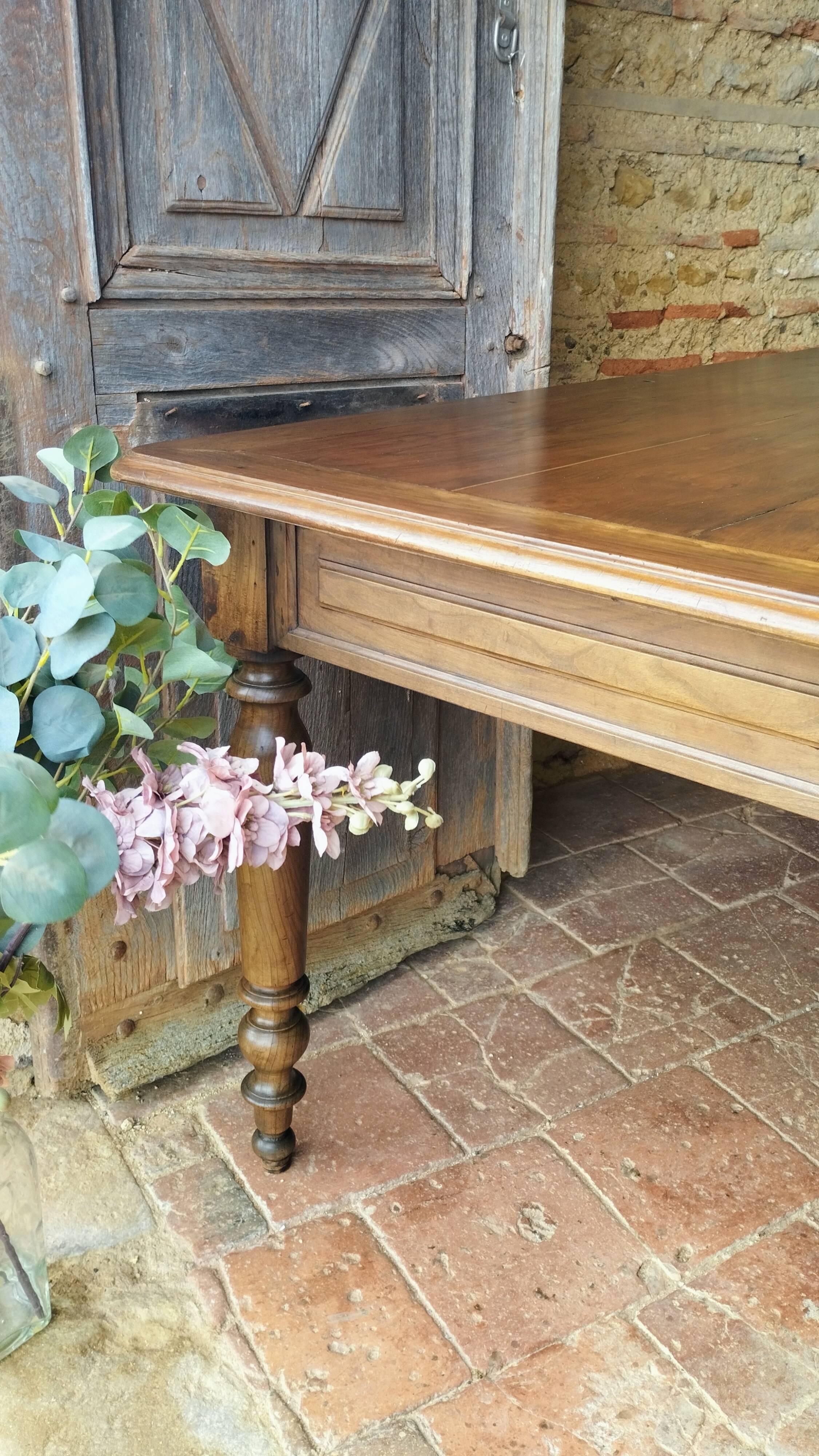 Old French farmhouse table in walnut, turned legs, waxed finish