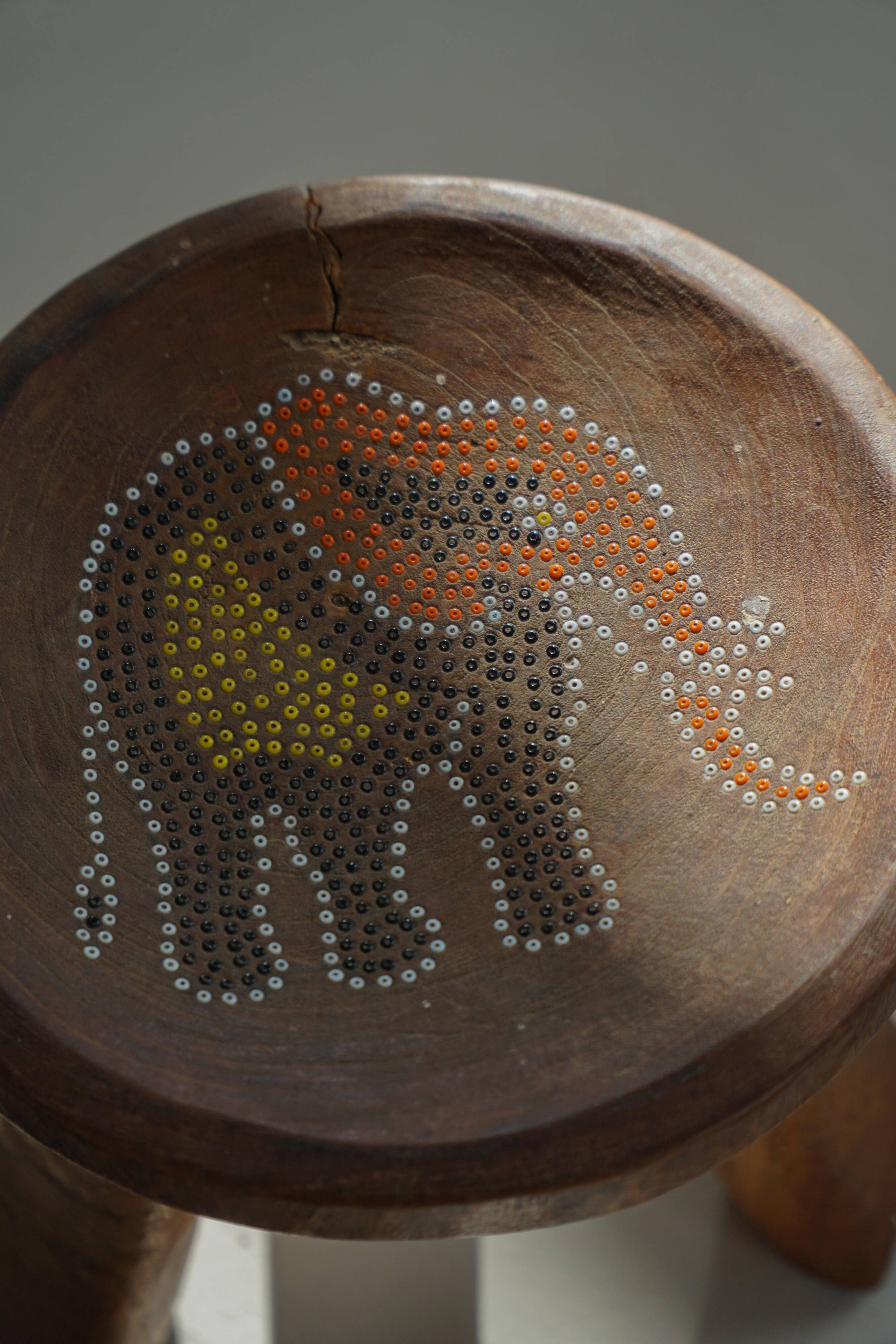 Small tripod stool Kamba hand-carved, elephant motif, Kenya, mid-20th century.