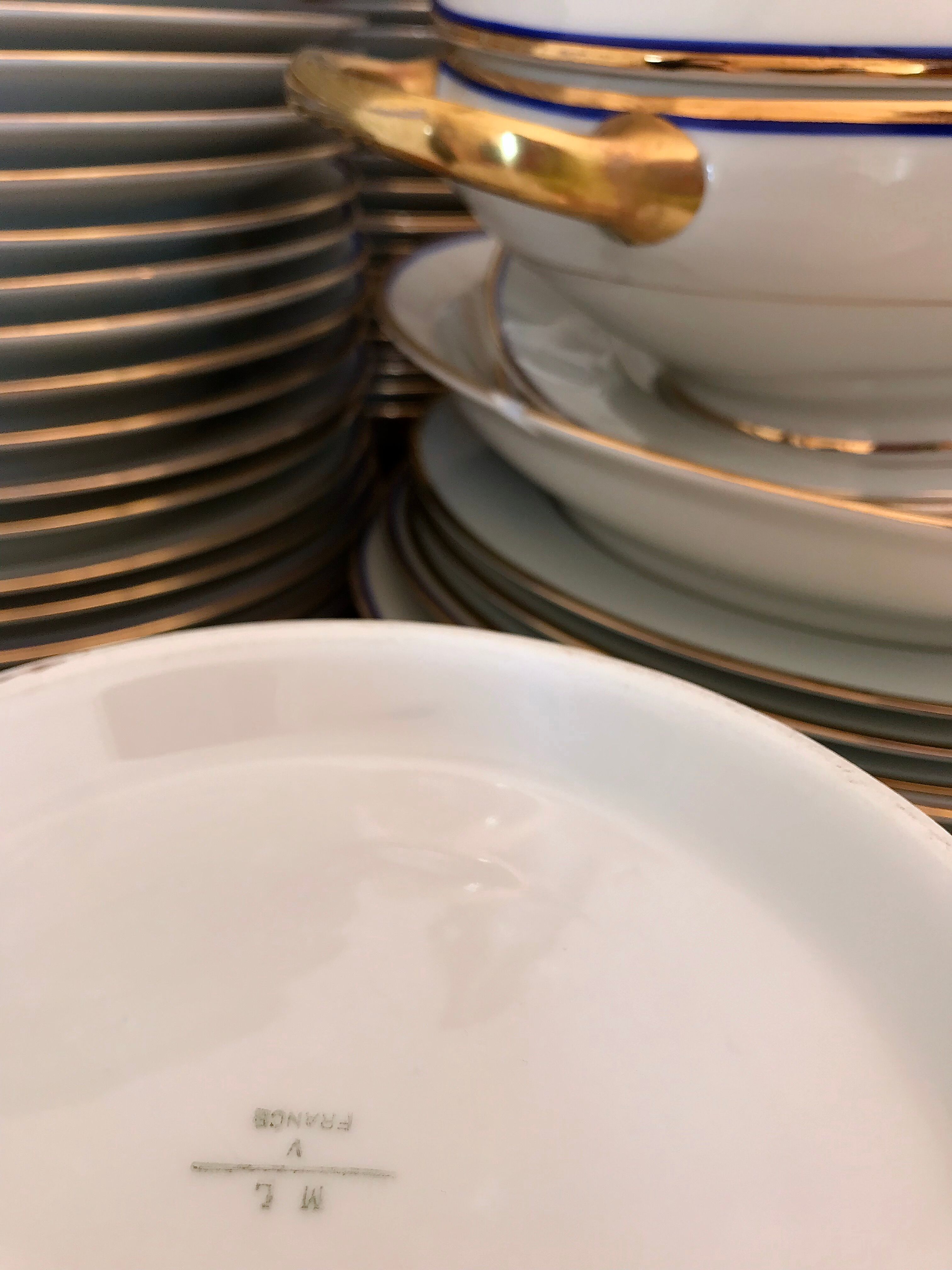 table service art deco limoges porcelain white border blue and gold 61 pieces signed