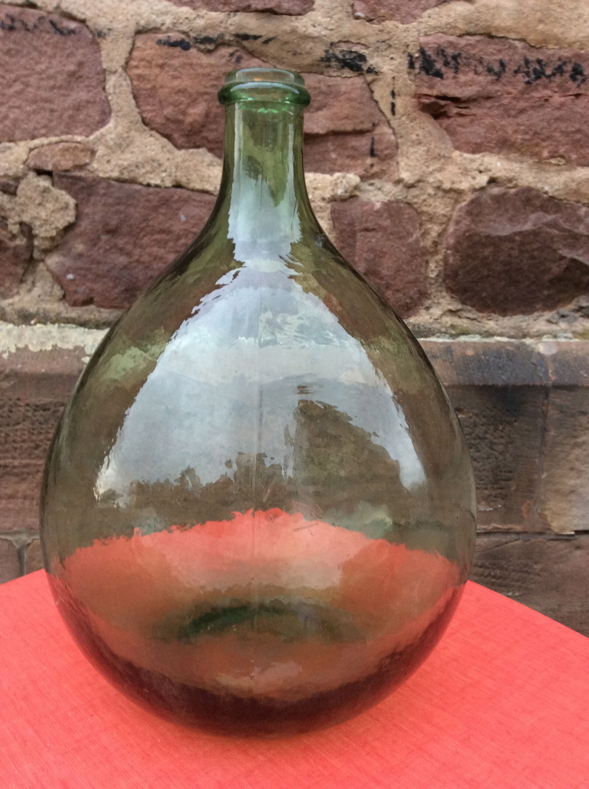 Demijohn bottle in green glass, 5-litre container