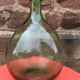 Demijohn bottle in green glass, 5-litre container