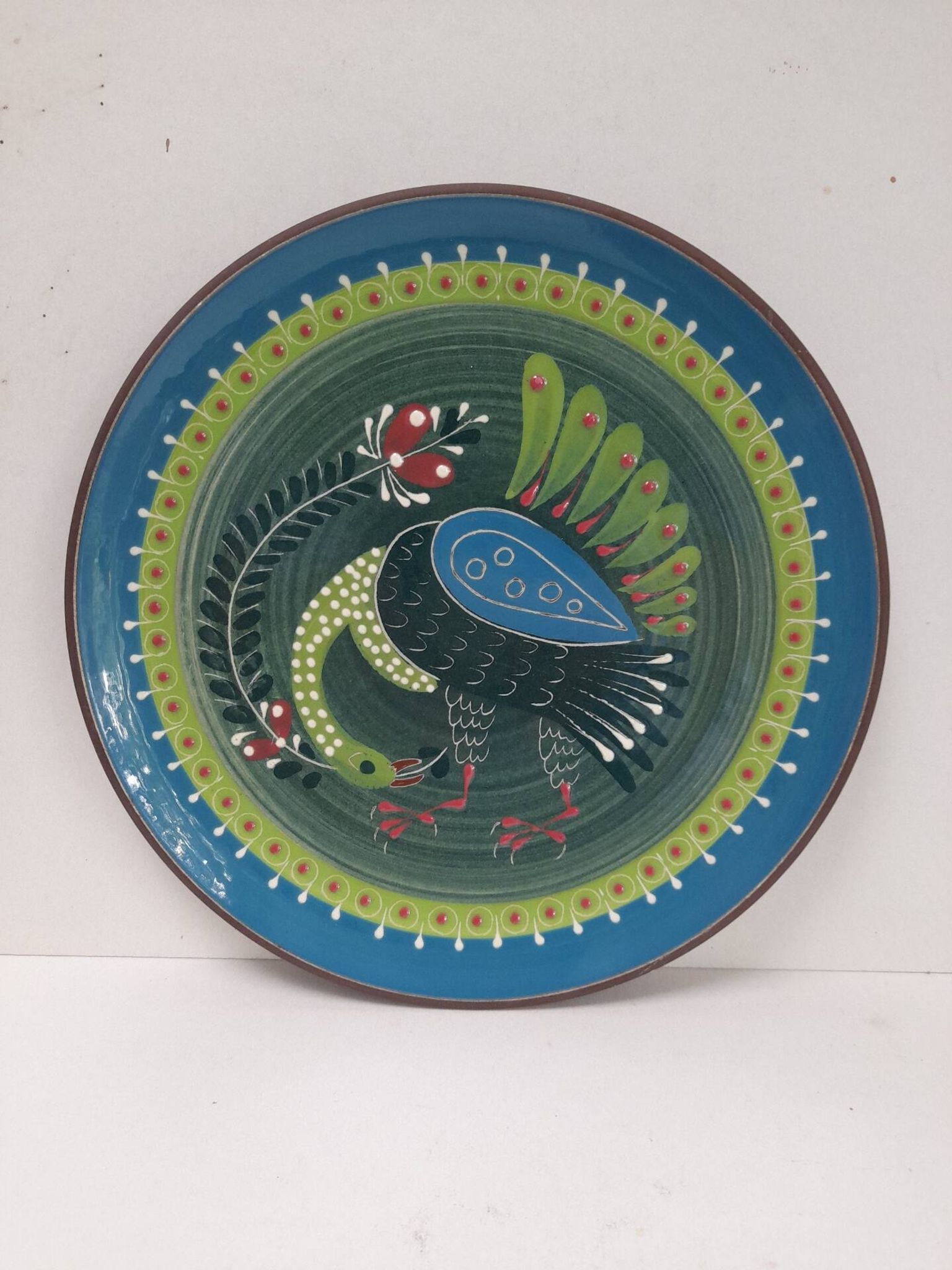 Assiette murale oiseau folklorique
