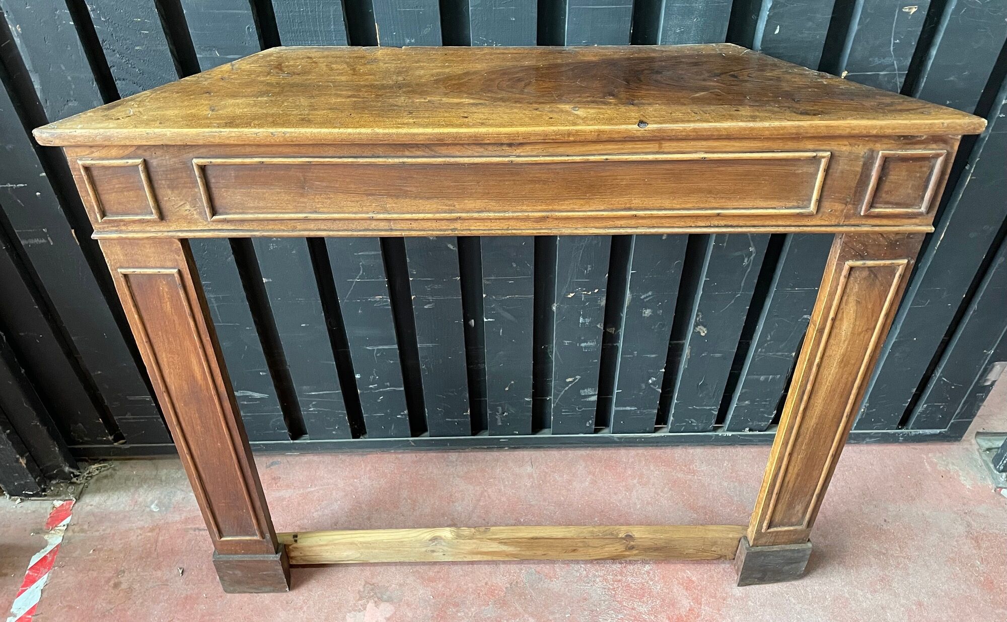 Front or frame or facade of fireplace of the nineteenth century in walnut wood carved by hand.