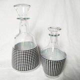 Set of 2 black and white houndstooth glass carafes from the Arques crystal factory. Rare.