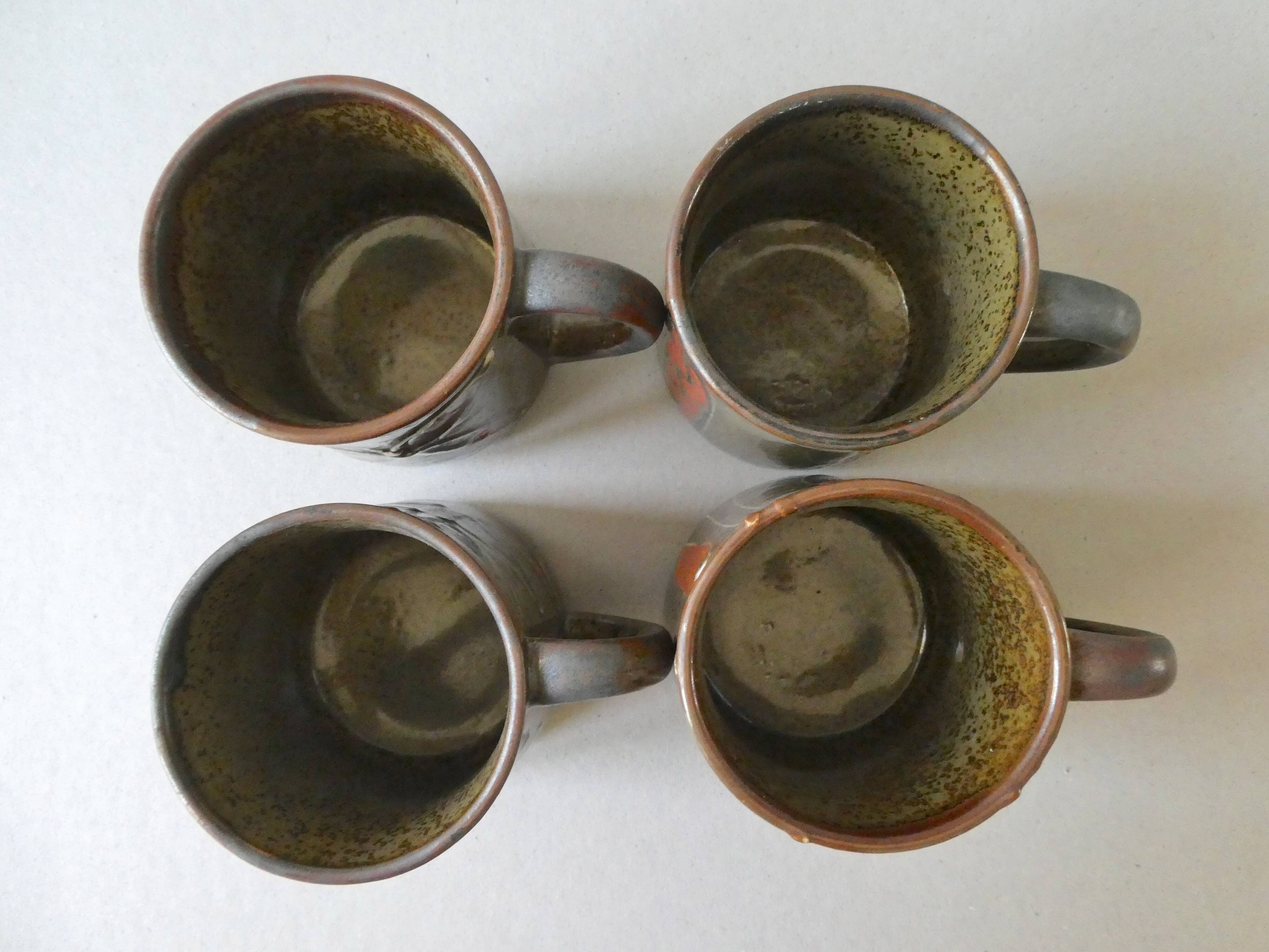Set of 4  sandstone mugs 70 years