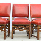 6 red leather chairs